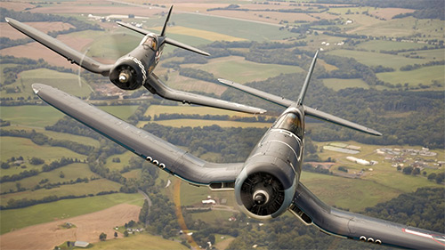 A pair of Corsairs in the air